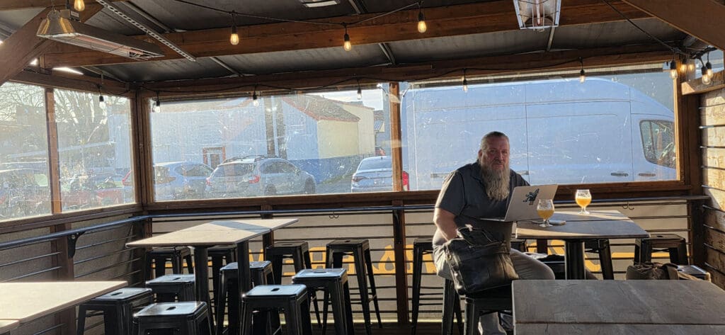 Brady in the covered and heated portion of Reuben's Brews beer garden