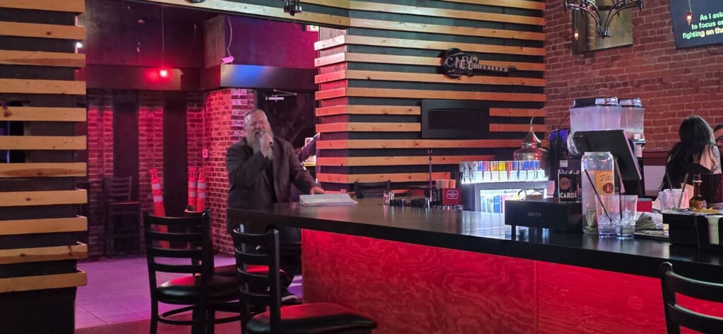 Brady singing at The Royal Night Club in Bellingham