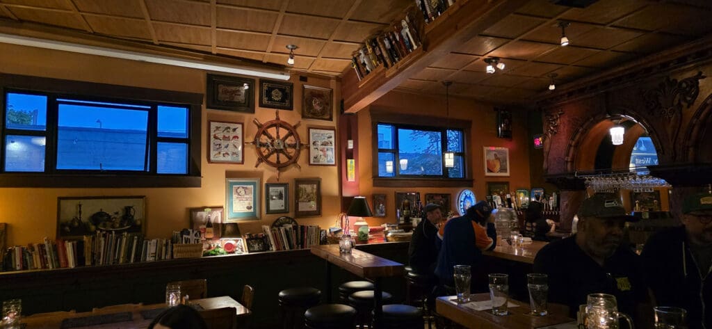 3 shots capturing the warm, inviting interior of Beverage Place Pub