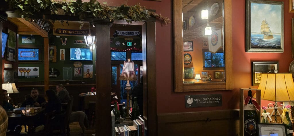 3 shots capturing the warm, inviting interior of Beverage Place Pub