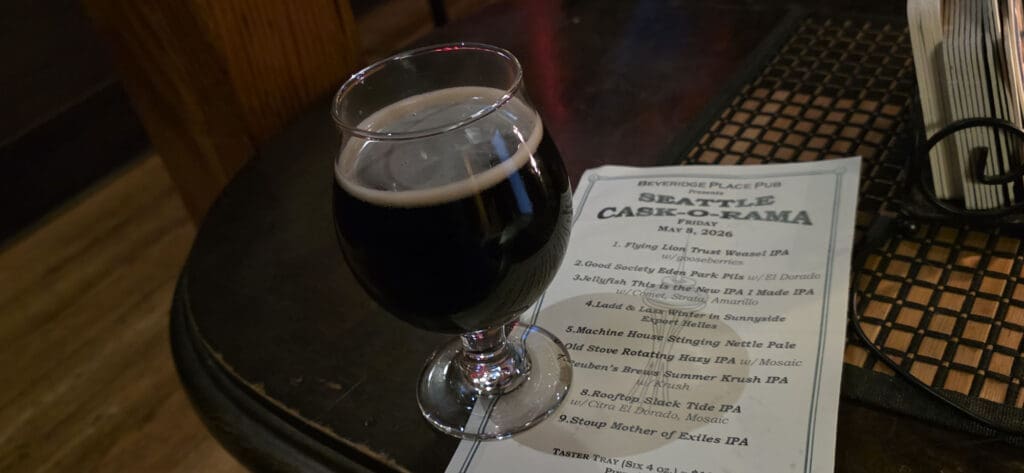 The 18lb Armagnac Imperial Porter by Georgetown Brewing resting next to the Cask-O-Rama flyer